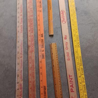Collection of wooden yard sticks