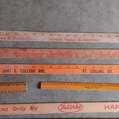 Collection of wooden yard sticks