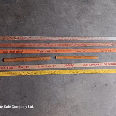 Collection of wooden yard sticks