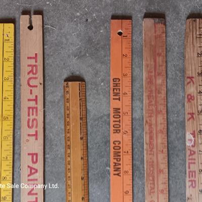 Collection of wooden yard sticks