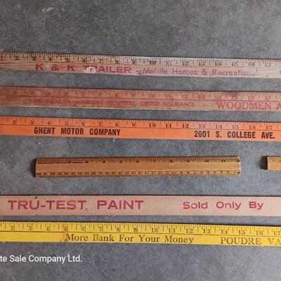 Collection of wooden yard sticks