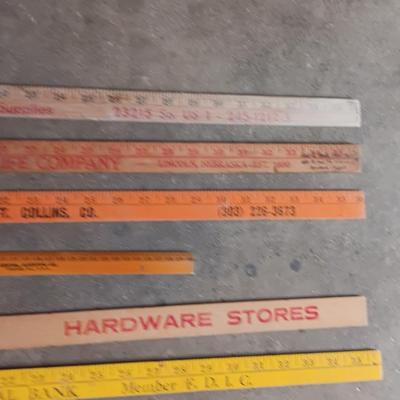 Collection of wooden yard sticks