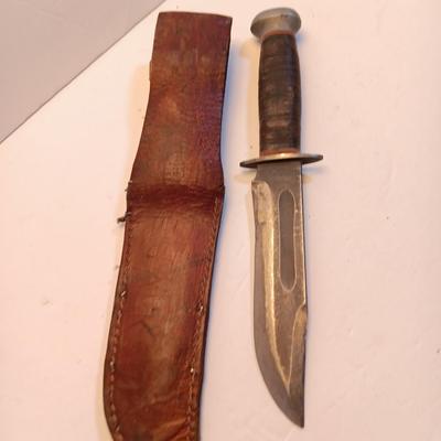 Hunting knife with leather sheath