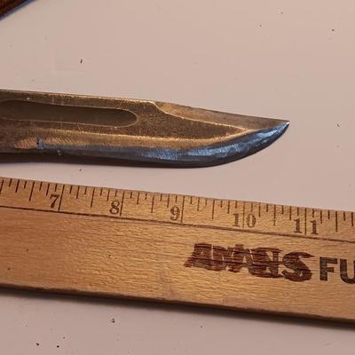 Hunting knife with leather sheath