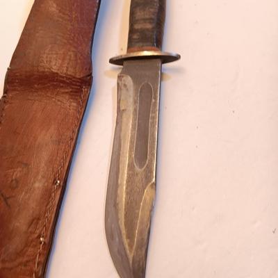 Hunting knife with leather sheath