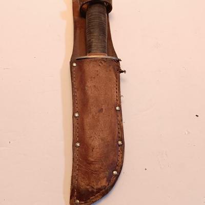 Hunting knife with leather sheath