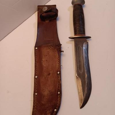 Hunting knife with leather sheath