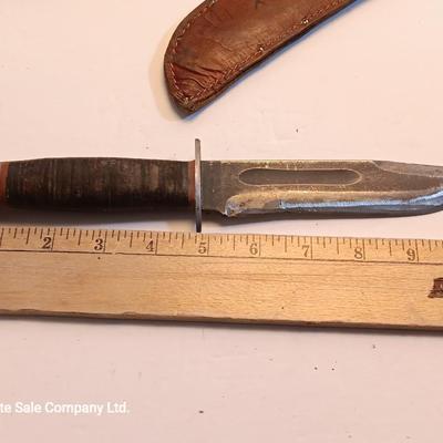 Hunting knife with leather sheath