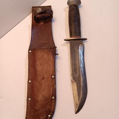 Hunting knife with leather sheath