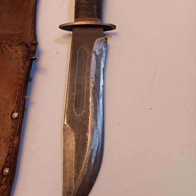 Hunting knife with leather sheath