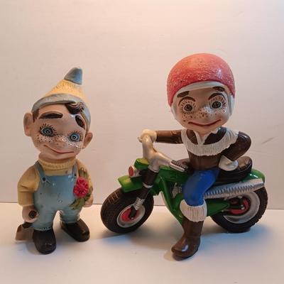 Vintage Atlantic Mold company Boy on motorbike and boy planting flowers