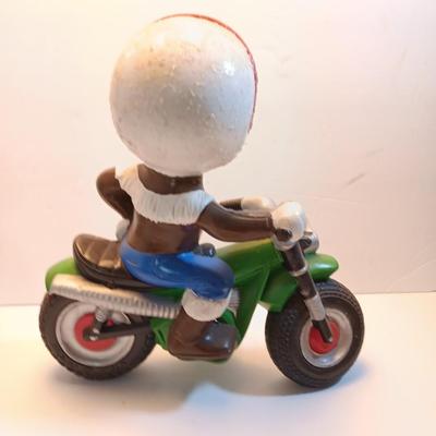 Vintage Atlantic Mold company Boy on motorbike and boy planting flowers