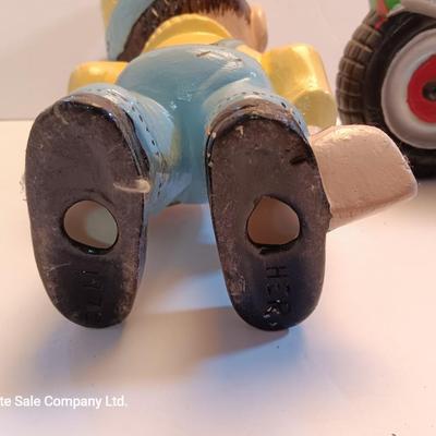 Vintage Atlantic Mold company Boy on motorbike and boy planting flowers
