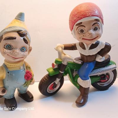 Vintage Atlantic Mold company Boy on motorbike and boy planting flowers