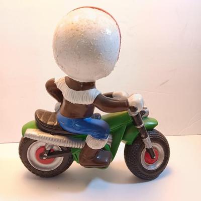 Vintage Atlantic Mold company Boy on motorbike and boy planting flowers