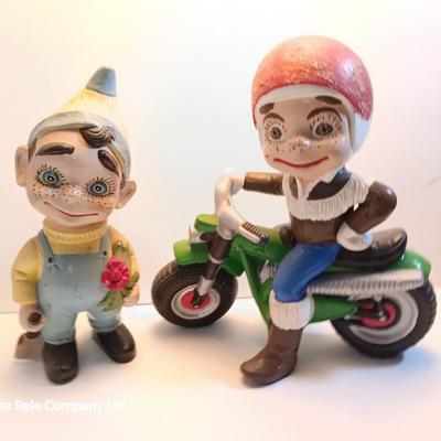 Vintage Atlantic Mold company Boy on motorbike and boy planting flowers