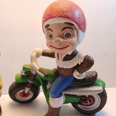 Vintage Atlantic Mold company Boy on motorbike and boy planting flowers