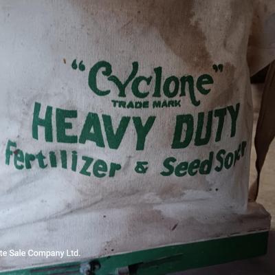 Antique canvas heavy duty fertilizer and seed Co, spreader and other Antique yard tools