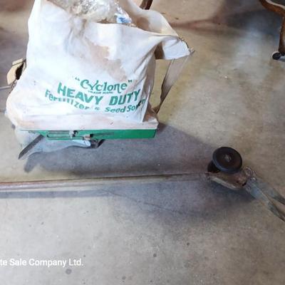 Antique canvas heavy duty fertilizer and seed Co, spreader and other Antique yard tools