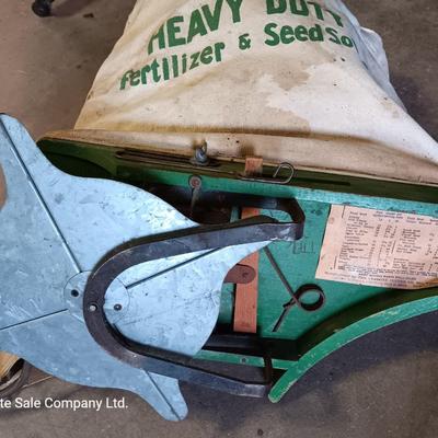 Antique canvas heavy duty fertilizer and seed Co, spreader and other Antique yard tools