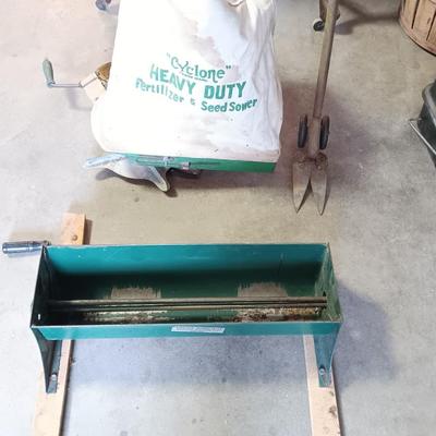 Antique canvas heavy duty fertilizer and seed Co, spreader and other Antique yard tools
