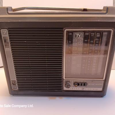 General Electric Model 7-2963A AM/FM/ TV PS AIR Instant weather electric or battery operated radio