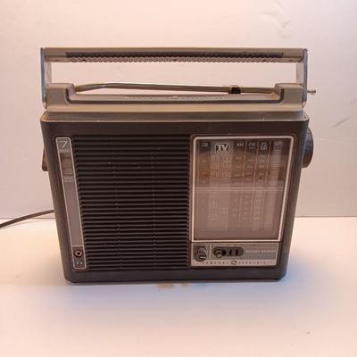 General Electric Model 7-2963A AM/FM/ TV PS AIR Instant weather electric or battery operated radio