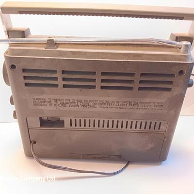 General Electric Model 7-2963A AM/FM/ TV PS AIR Instant weather electric or battery operated radio