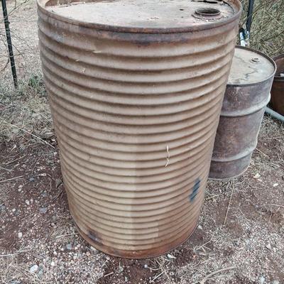 Two antique steel barrels