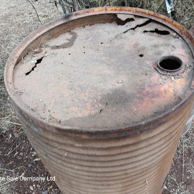 Two antique steel barrels