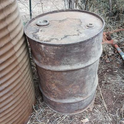 Two antique steel barrels