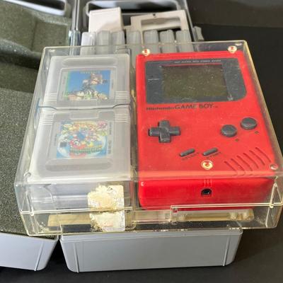 LOT 172U: Original Gameboy (Red) with Games and Two Cases