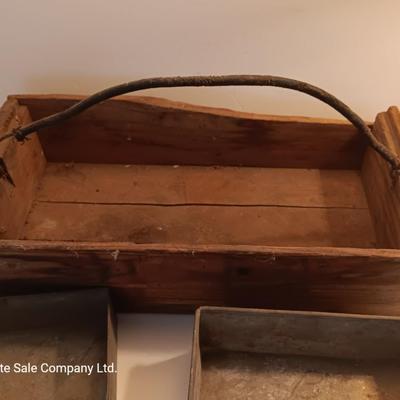 Antique wooden box with two metal boxes some old bottles and a vintage hay hook