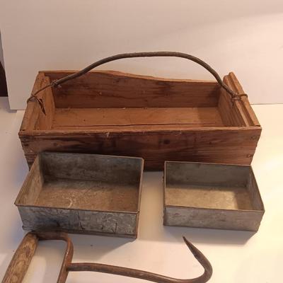 Antique wooden box with two metal boxes some old bottles and a vintage hay hook
