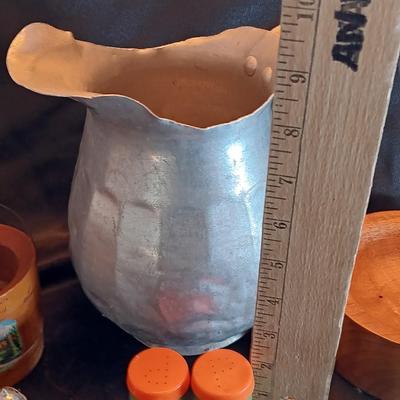 Vintage aluminum water pitcher with salt & pepper shakers and more