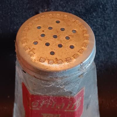Metal laser art etched tin tiles with salt & pepper and an old celery salt jar