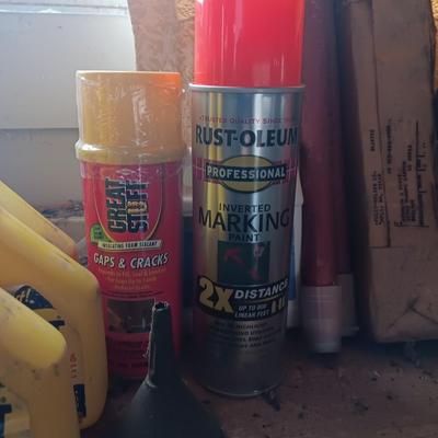 Garage / Automobile chemicals full to almost full bottles and containers