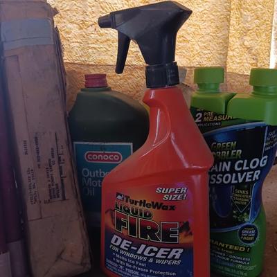 Garage / Automobile chemicals full to almost full bottles and containers
