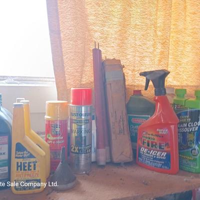 Garage / Automobile chemicals full to almost full bottles and containers