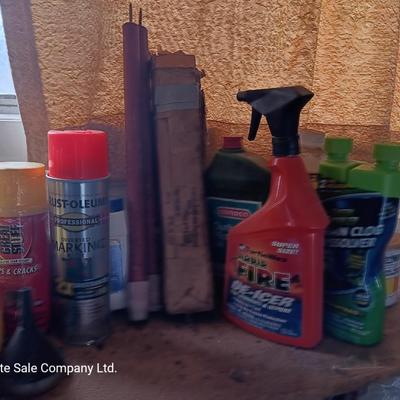 Garage / Automobile chemicals full to almost full bottles and containers