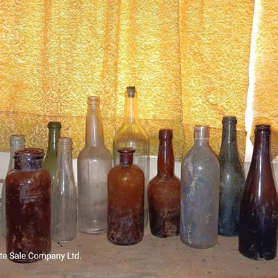 Variety of vintage glass bottles