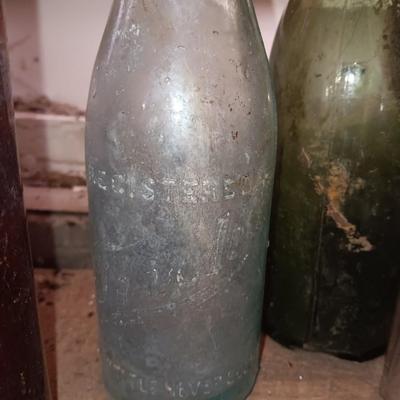Variety of vintage glass bottles