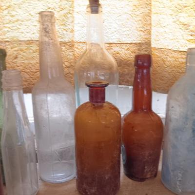 Variety of vintage glass bottles