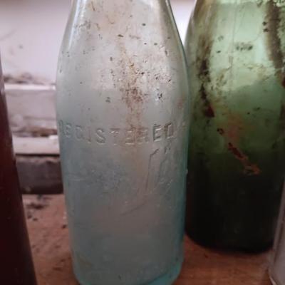 Variety of vintage glass bottles