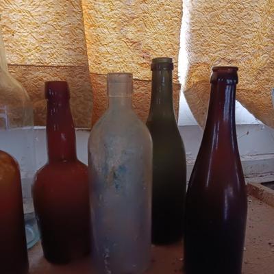 Variety of vintage glass bottles