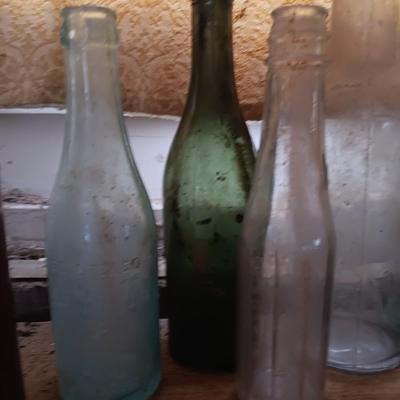 Variety of vintage glass bottles