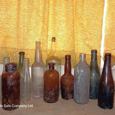 Variety of vintage glass bottles