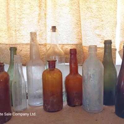 Variety of vintage glass bottles