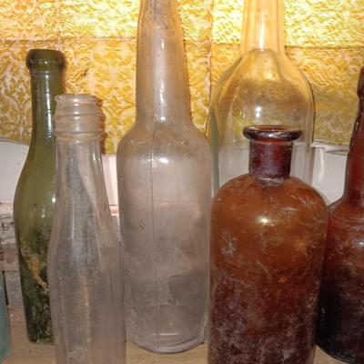 Variety of vintage glass bottles
