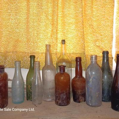 Variety of vintage glass bottles